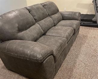Grape leather sleeper sofa. 91 inches long 39 inches deep