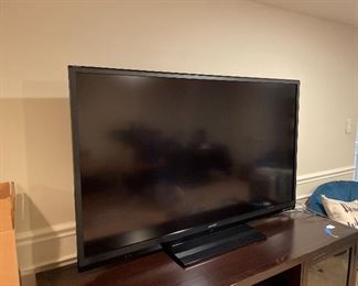 Sharp Aquos “60 inch LED smart TV with manual remote and box.