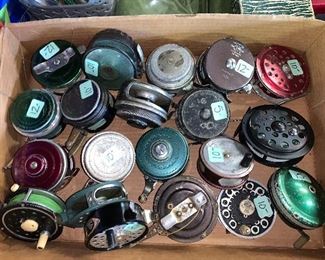 One of several boxes of fishing reels