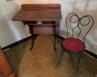 Child's antique school desk and bent wire ice cream chair