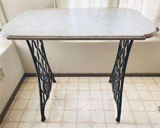 White marble bistro table with iron base