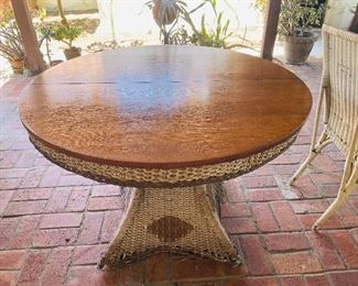 Tiger (quartersawn) oak topped wicker table and two chairs c1910, Craftsman style