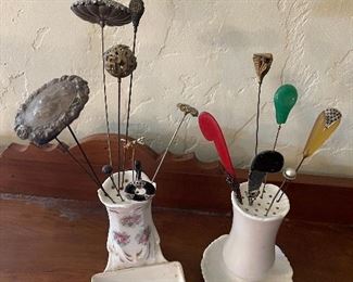 Antique hat pins and holders