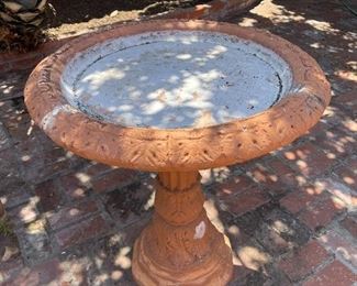 Terra cotta birdbath