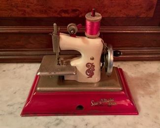 Strabo Sew O'Matic miniature child's sewing machine