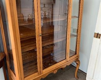 Vintage display cabinet. Wood interior shelves. 