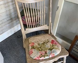 Antique rocker. Has been painted and recovered 
