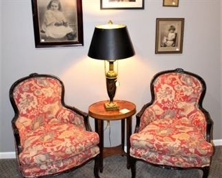 Pair of carved, upholstered chairs.  