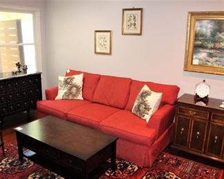 The family room is filled with very nice furniture and home decor.  