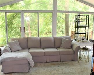 Sunporch with sectional sofa.  