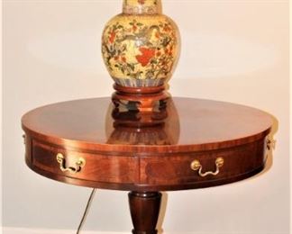 Baker banded round table with drawers.  31 inches in diameter.  