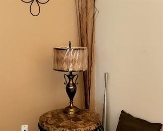 One of a pair of wall hangings, metal base marble top lamp stand