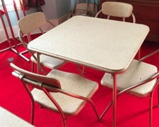 Mid-century Costco table and 4 chairs. 2 sets