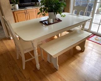 Custom made French Farmhouse table and 2 bench seats. (End chairs not included.)