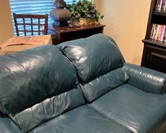 Dark green  2-cushion leather sofa