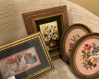 Two oval framed needlepoint selections