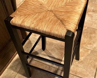 One of two small barstools