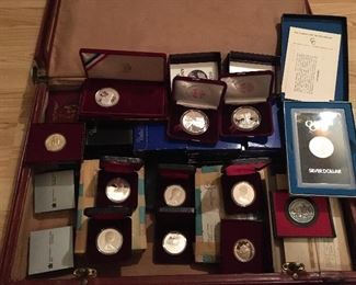 A full size suitcase full of silver and collectible coins