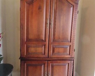 Armoire which make a great bar area or great for storage.