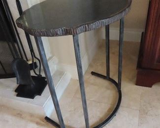 Metal side table - buts up against chair