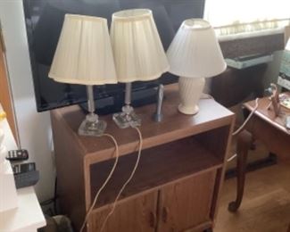 Tv stand….$20 .  Measures 27 x 16 x 39.  and lamps