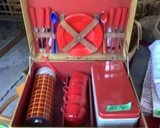 Vintage picnic basket….has all the items: thermos, tin container, plastic plates and cups, red handle flatware.  $70 presale