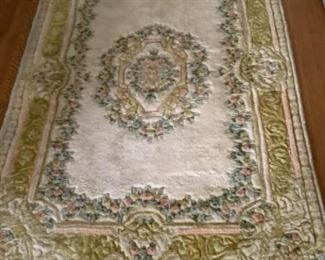 Peach, green and off white 4x6 rug.  $75 presale