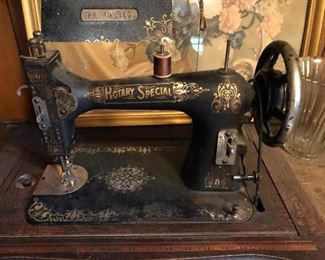 Rotary Special sewing machine in wooden stand.