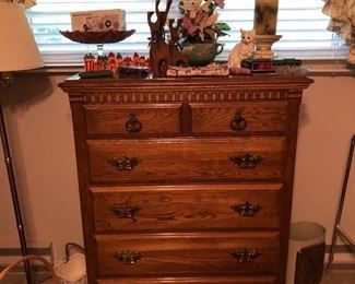 Kincaid Solid Wood Furniture chest of drawers. Wooden reindeer, Roseville bowl with flowers, candle and more.