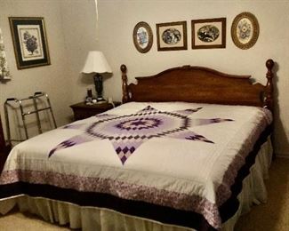 Kincaid Solid Wood Furniture king size bed, star quilt, wall pictures.