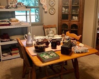 Really cute drop leaf table with 6 matching chairs.