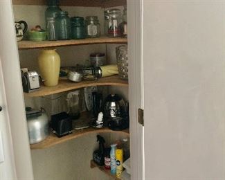 Vintage strainer, blue Ball jars, vases, Apsco pencil sharper, green enamel lemon squeezer, Dazey grinder,   Hankscraft egg cooker, Reeds nutcracker, Ultrex blender, Sunbeam Oskar Jr. chopper plus, huge vintage tea kettle and more 