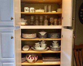 Cabinets packed with useful everyday items!  Vintage glasses, Christmas glasses, Marker Oldest Pottery, “Royal Gadroon”, lilac plates, Noritake “Thea” serving for 8+ platter and bowl cream and sugar, vintage Libby glasses ! 