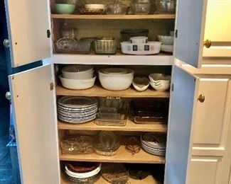 Cabinets packed with useful everyday items! Sunbeam “glassbake”, Franciscan bowls, Anchor Hocking casserole’s dishes, refrigerator dishes and so much more! 