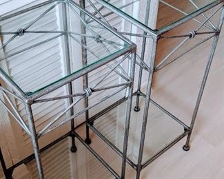 Matching pair of heavy duty glass accent tables. 