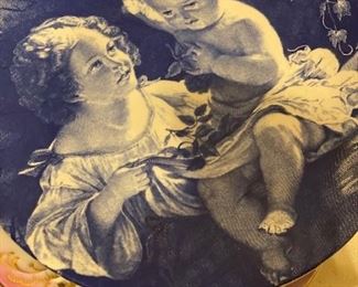 Collectible plate with cherub