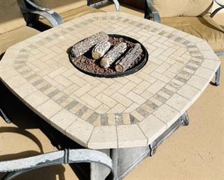 3.  Fire pit and four outdoor arm chairs with cushion  • $250