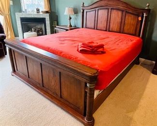 12.  Mediterranean king size bed with mattress •  66 high 78 wide 94 deep •  $450