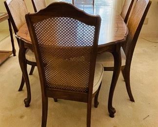 8.  American traditional dining table • 29high 74wide 40deep • One arm chair, five side chair • 42high 20wide 21deep • $395