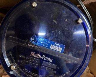 Basement. This aquarium pump I’m addition to a box full of aquarium items.