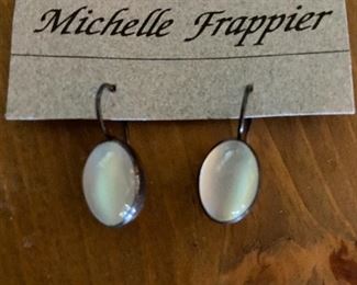 One pair of MANY earrings