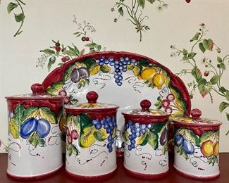Item 32:  (4) Canisters & Serving Platter (Made in Italy):   $85                                                                                                             Tallest Canister - 8.5"                                                                                      Platter - 18.5"