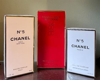 Item 112:  No 5 Chanel 1.7 Fl. Oz. (left):  $65                                                                Item 113:  Elizabeth Arden Red Door (middle): $30                                                    Item 114:  No 5 Chanel 3.4 Fl Oz. (right):  $85
