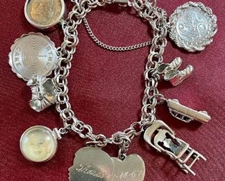 Item 203:  Sterling Silver Charm Bracelet:  $85