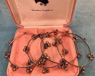 Item 294:  Audrey Hepburn Set of 4 Bell Bangles:  $38