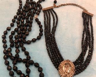 Item 376:  Vintage 60" Faceted Bead Necklace (left):  $20                                                                                                     
Item 377:  Faceted Black Bead Necklace with Crystal Stone:  $20                  
