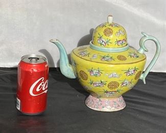 #19 - Late 19th c yellow ground famille rose wine pot.
More photos: https://flic.kr/s/aHsmWodRgM
8.5”tall x 10.5” spout to handle x 7”wide. - Wear to enamels due to use.