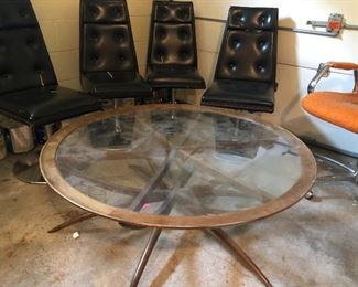 MCM Spider Leg Table & groovy black vinyl chairs