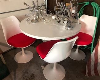 Late 60’s - early 70’s Saarinen Style Dining Table & Chairs
Reproduction Sputnik Light Fixture
70’s Chrome Light Fixture