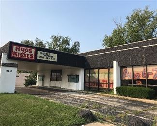 Hugs & Kisses store at 3215 Douglas Ave Racine WI 53402.!It used to be a drive in bank! Plenary of free parking the adjacent lot.